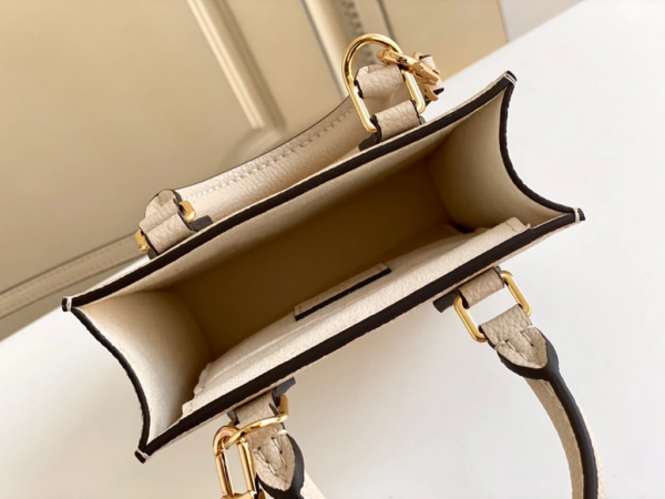 Túi Louis Vuitton Petit Sac Plat Monogram Empreinte Cream Leather M80449 - Ảnh 3