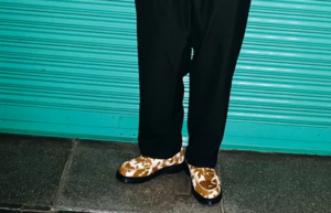 Giay Dr. Martens Penton Tassel Loafer 'Supreme Cow Print' 31373935