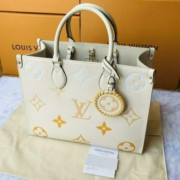 Túi Louis Vuitton OnTheGo MM Monogram Empreinte Leather M45717 - Ảnh 4