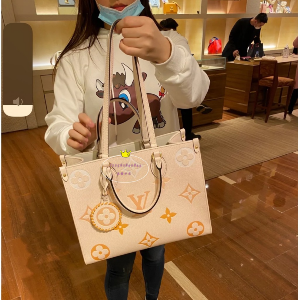Túi Louis Vuitton OnTheGo MM Monogram Empreinte Leather M45717 - Ảnh 2