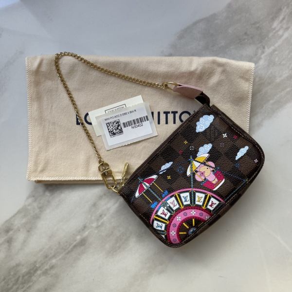 Túi Louis Vuitton Pochette Accessoires Mini Pink Coated Canvas Wristlet N60402 - Ảnh 3