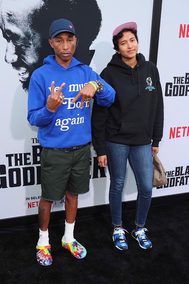 crocs with pharell and girl friend