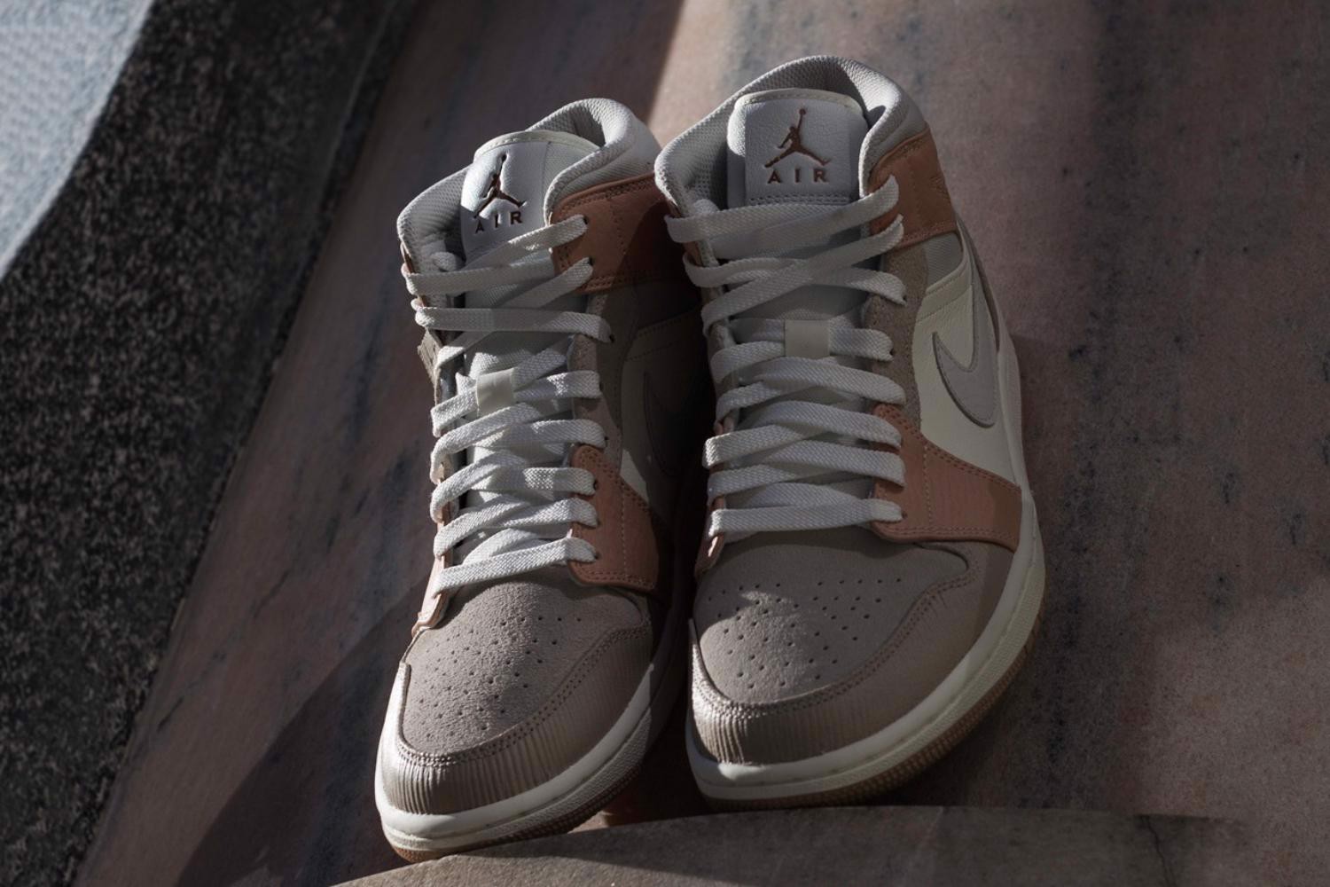 air-jordan-1-mid-milan-mang-tren-minh-cong-trinh-kien-truc-co-dien-nuoc-y