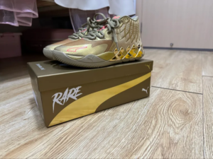 Giay Puma MB.01 Jr 'Golden Child' 379297-01