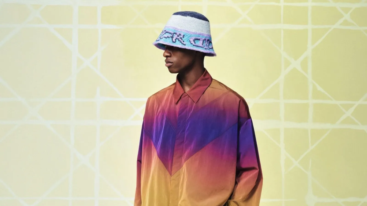 Lewis Hamilton trong bo suu tap Dior x Lewis Hamilton 2025, lay cam hung tu Afrofuturism va thoi trang cao cap.