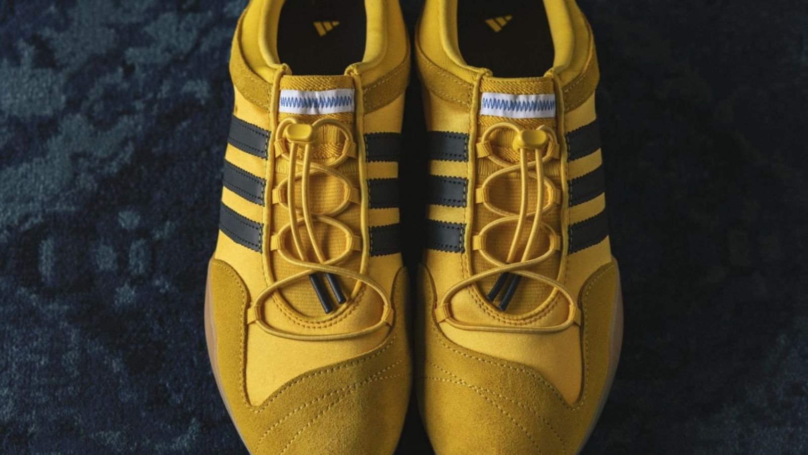 Hinh anh 8: Giay sneaker vang-den lay cam hung tu Kill Bill va Bruce Lee